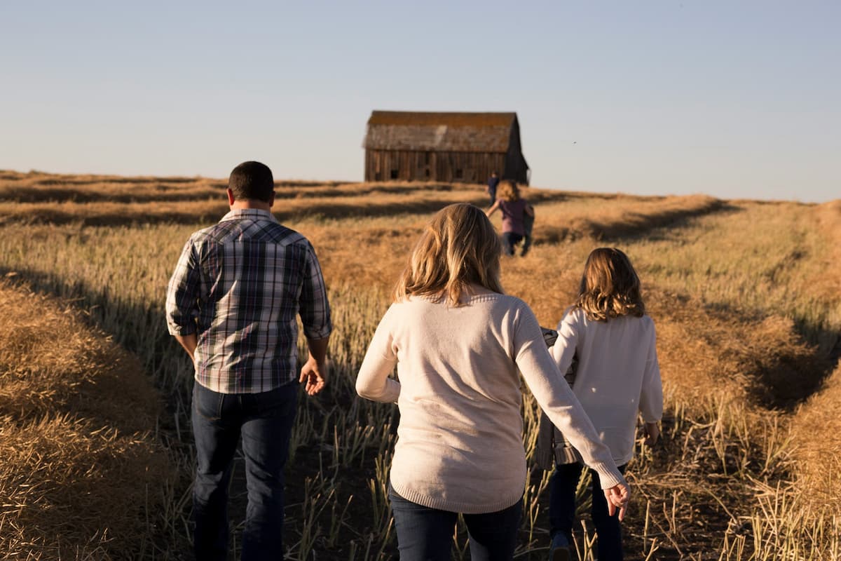 Farming Family walking in a field