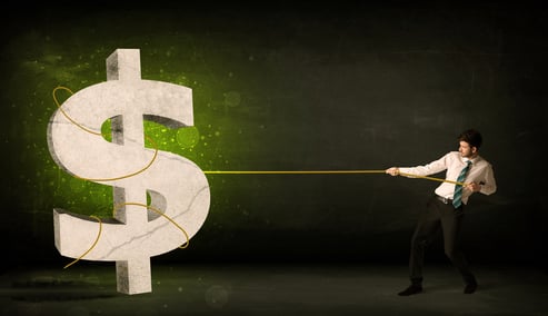 Business man pulling a big green dollar sign concept on background