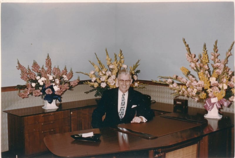 Arthur W. Hoese, founder of Security Bank & Trust Co., at his desk in 1958