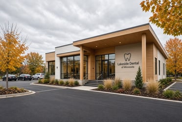 Modern single story dental office building with parking, the kind a practice buyer would finance
