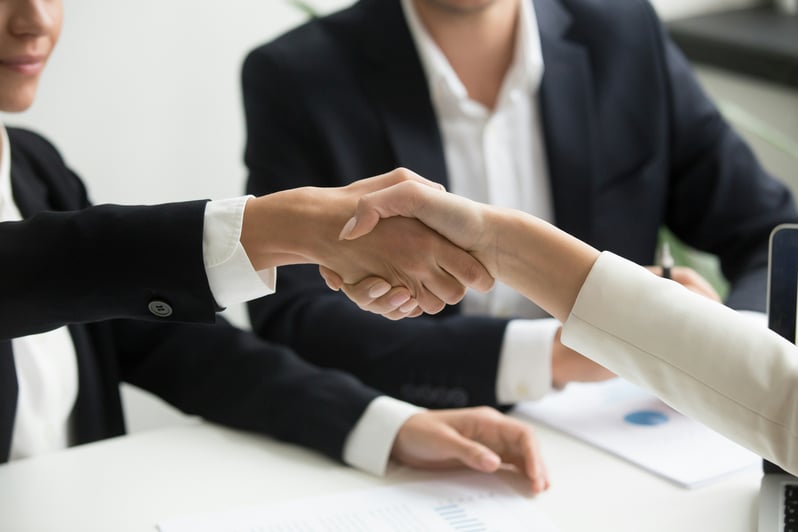 business professionals shaking hands