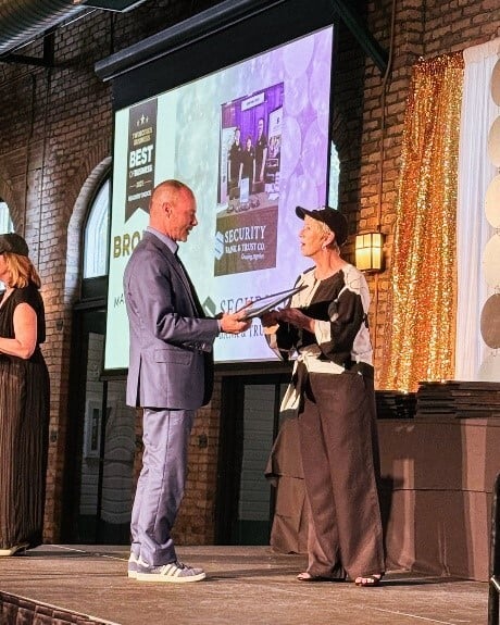 Marc Hoffmann, Executive Vice President of Trust at Security Bank & Trust Co., accepting the 2025 Twin Cities Business Bronze award for Best Wealth Management Provider in Minnesota
