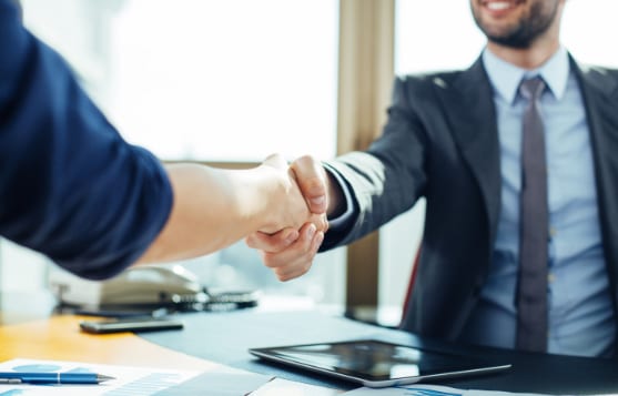 Businessman shaking hands with a customer